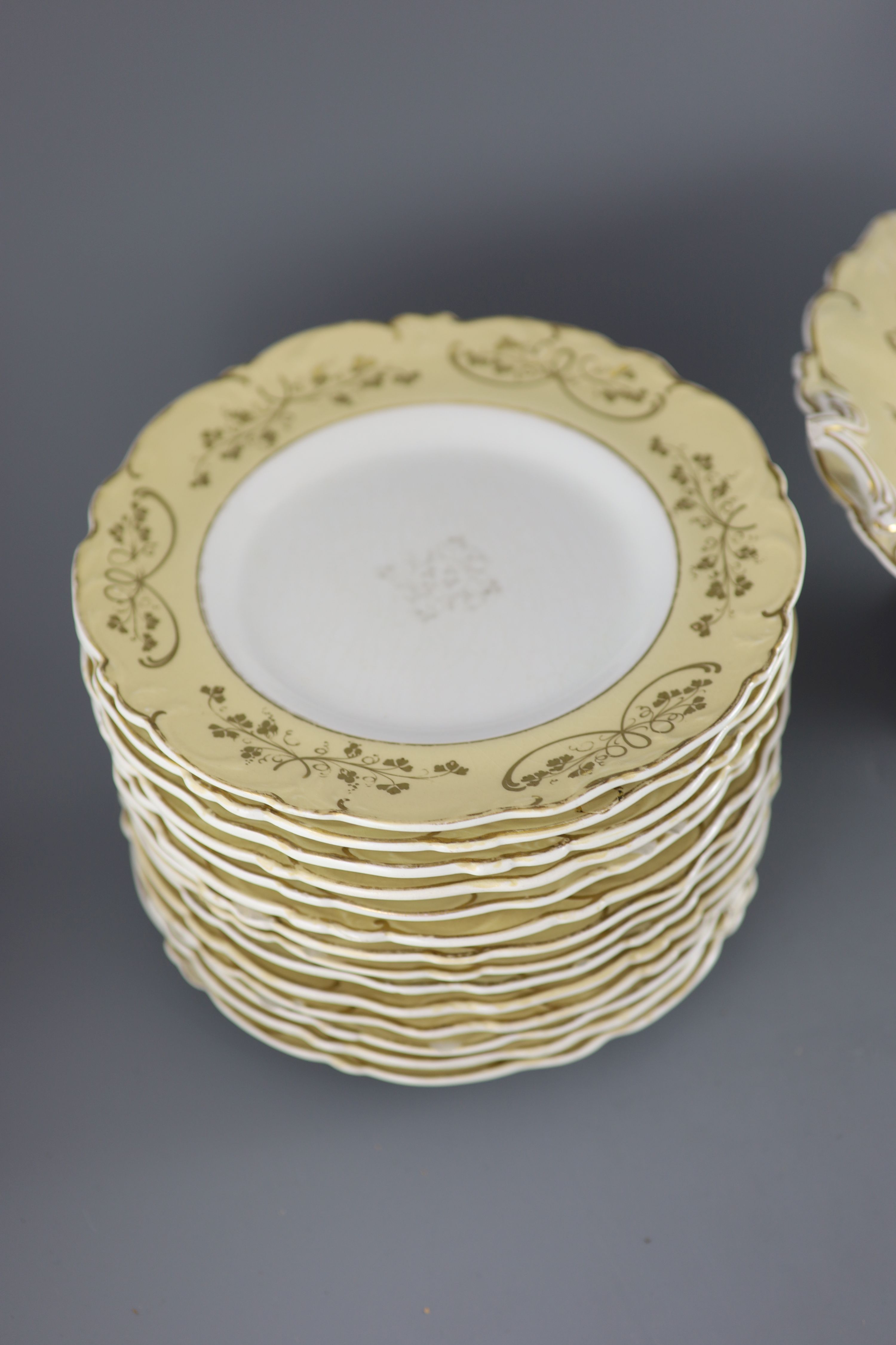 A Staffordshire cream and gilt twenty one piece part dessert service,